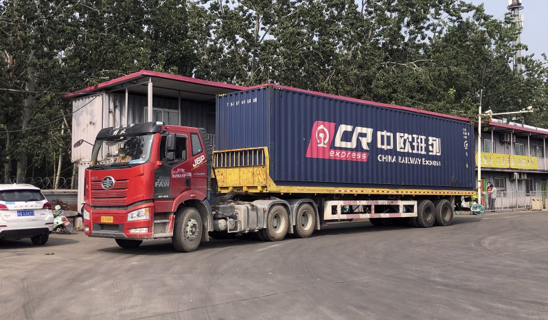 FAW J6P-380 tractor and container reference — 2021