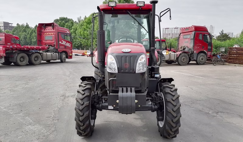 YTO EMF554X cab tractor photographed from the front at a vehicle yard